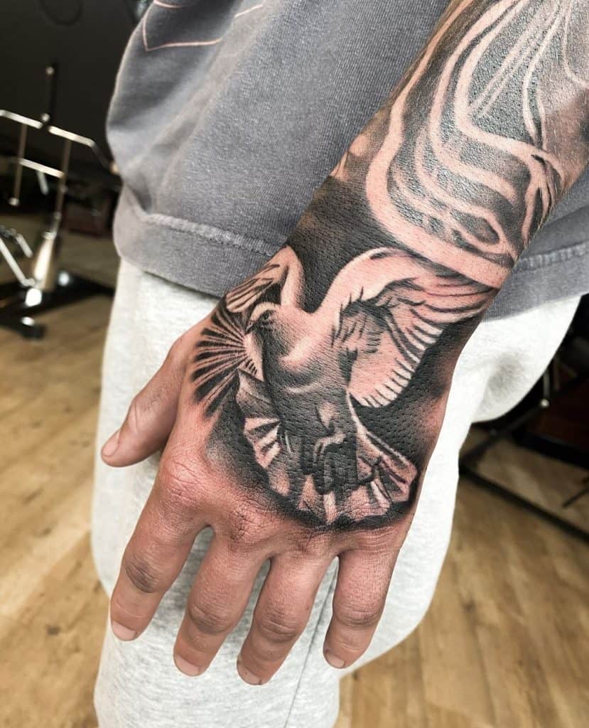 dove tattoo designs on hand